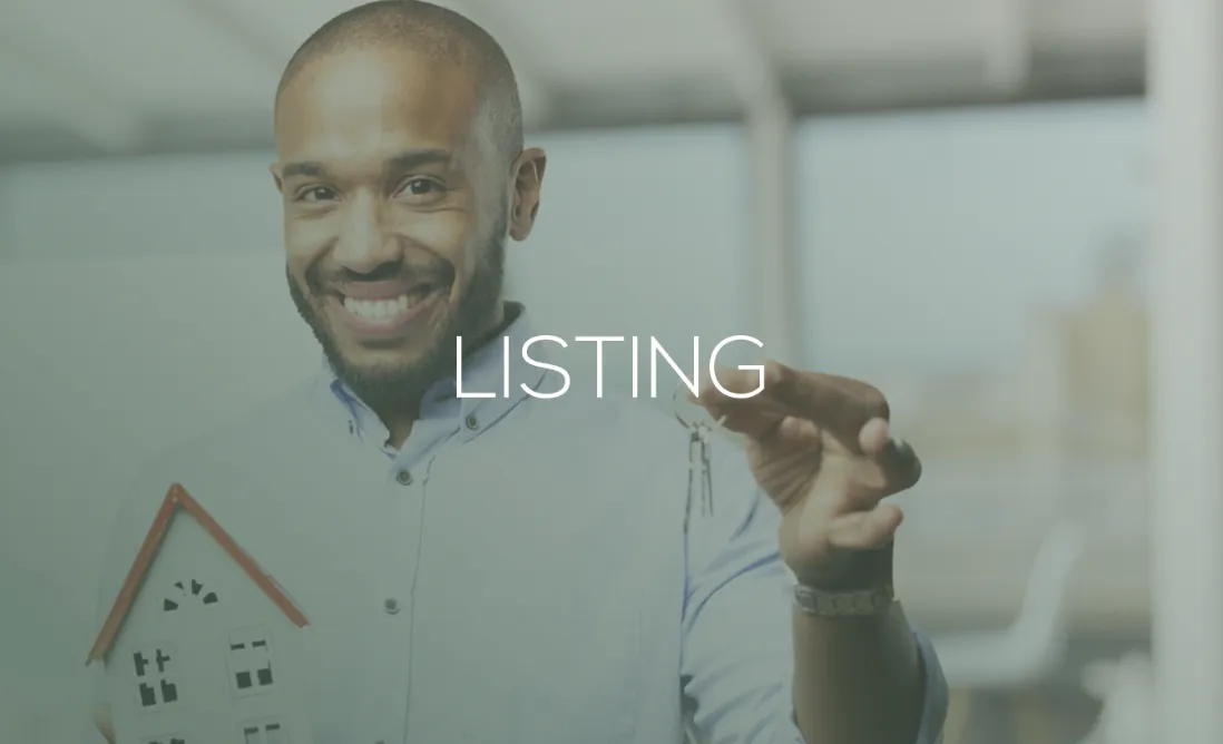 Person photographing a property for listing